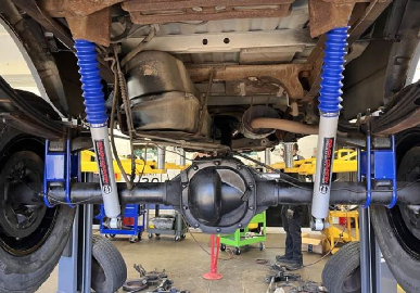 Car engine with essential vehicle maintenance tips infographic